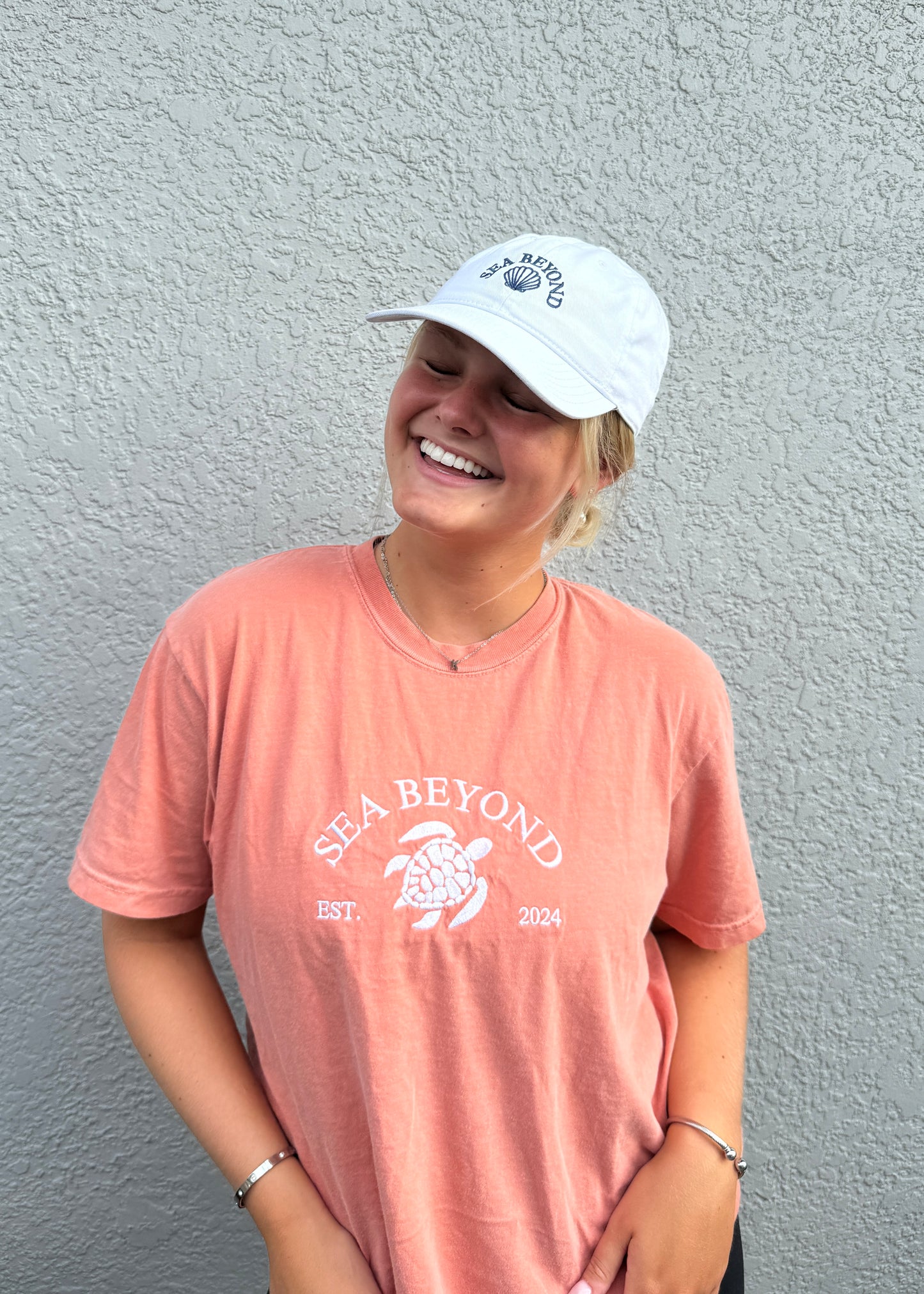 White & navy blue embroidered hat